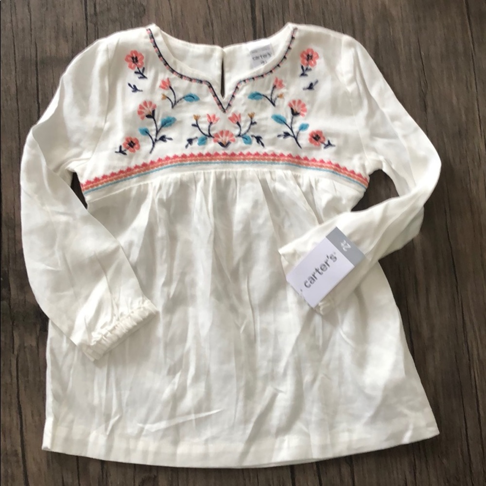 Carter’s ivory top with floral embroidered detail